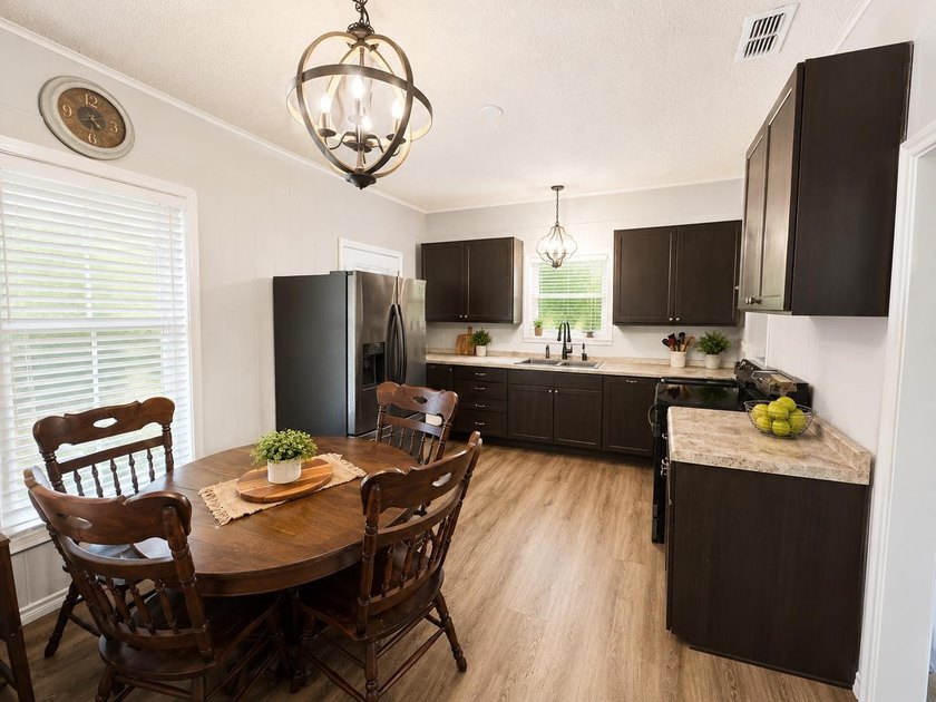 Charming retreat near the water! Nestled on almost an acre, this - photo 3