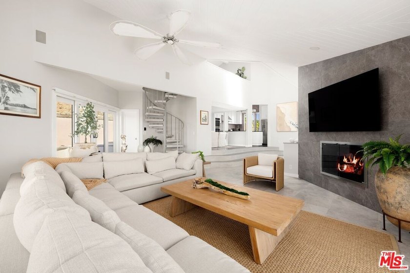 Perched above one of Orange County's most coveted stretches of - photo 6