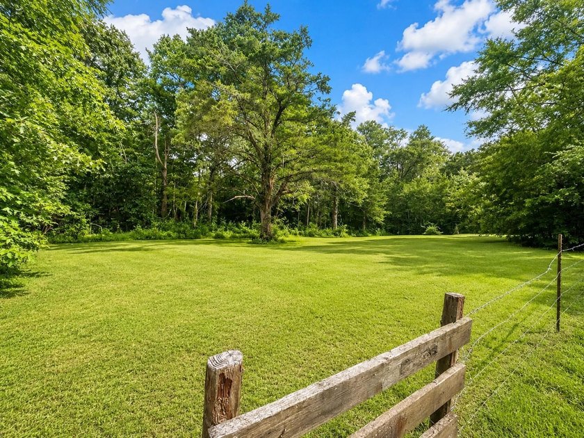Charming retreat near the water! Nestled on almost an acre, this - photo 10
