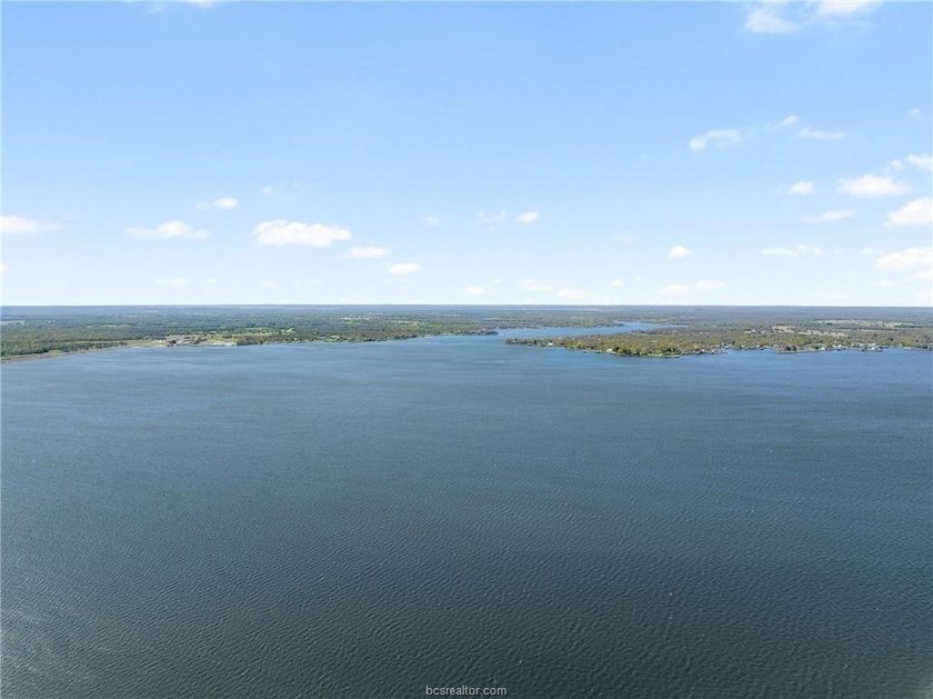 Want room to spread out near the water? These three wooded lots - photo 11