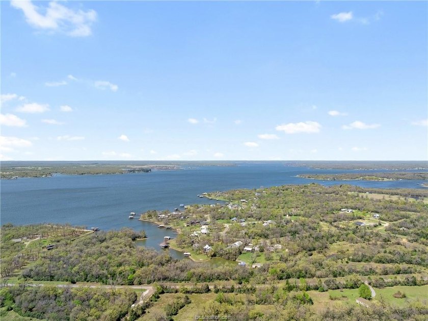 Want room to spread out near the water? These three wooded lots - photo 12