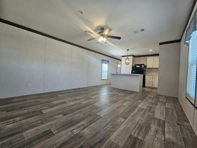 Wow!! This outstanding 2 bedroom and 2 bathroom home is located - photo 2