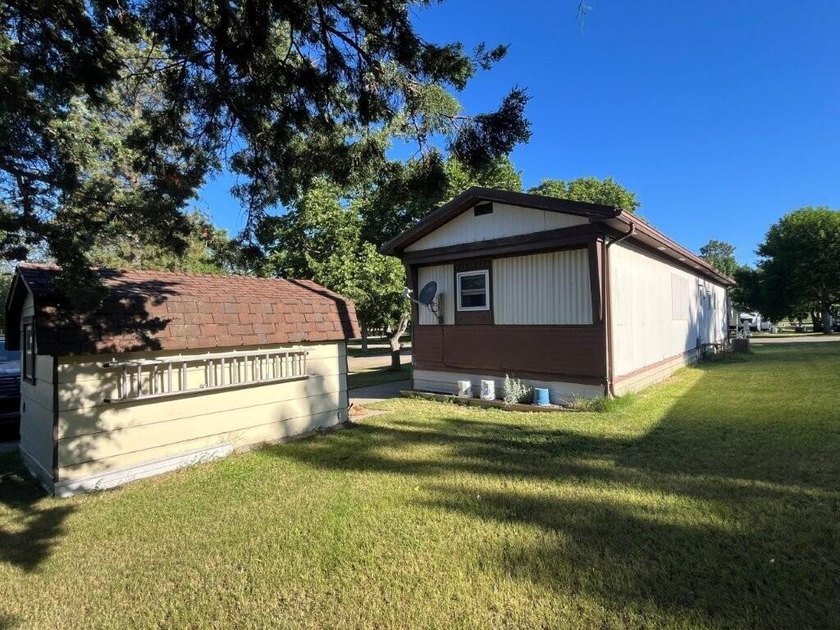 Affordable and move-in ready, this well-maintained 2-bedroom, 1 - photo 20