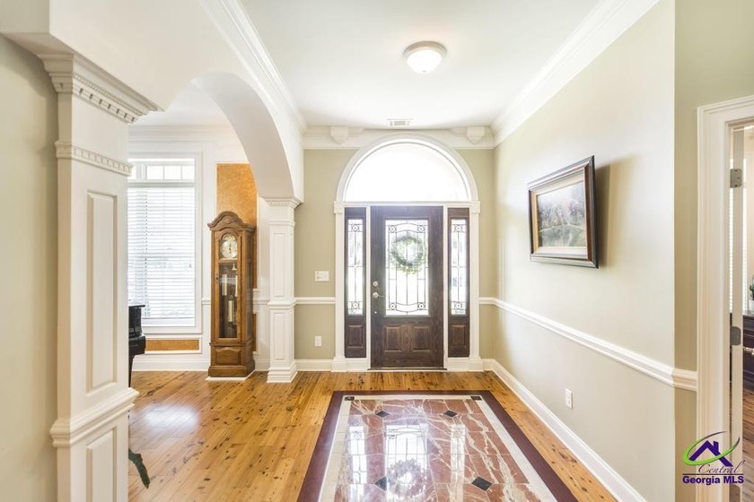 Welcome home to this stunning custom-built, four-sided brick - photo 4