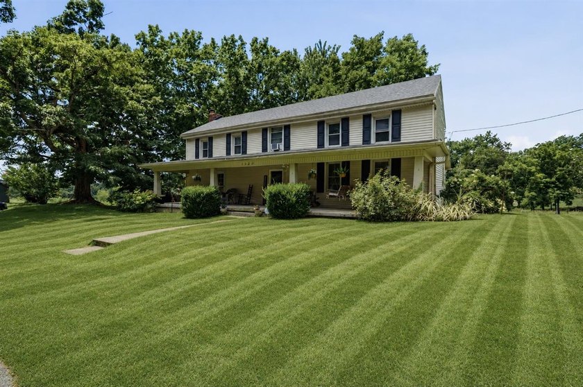 Escape to the peace and charm of country living with this - photo 2
