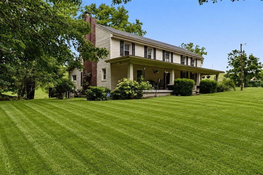Escape to the peace and charm of country living with this - photo 3