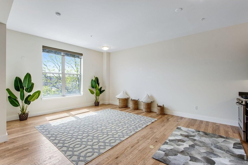 Experience contemporary downtown living at 204 Maple St, Unit - photo 3
