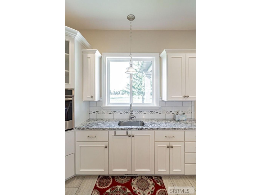 Main-level living at its finest - and yes, your backyard is the - photo 13