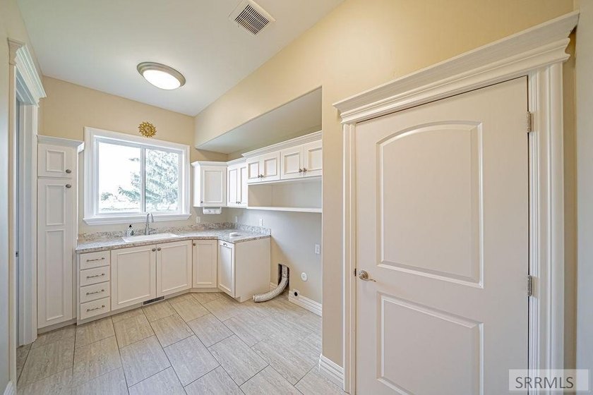 Main-level living at its finest - and yes, your backyard is the - photo 14