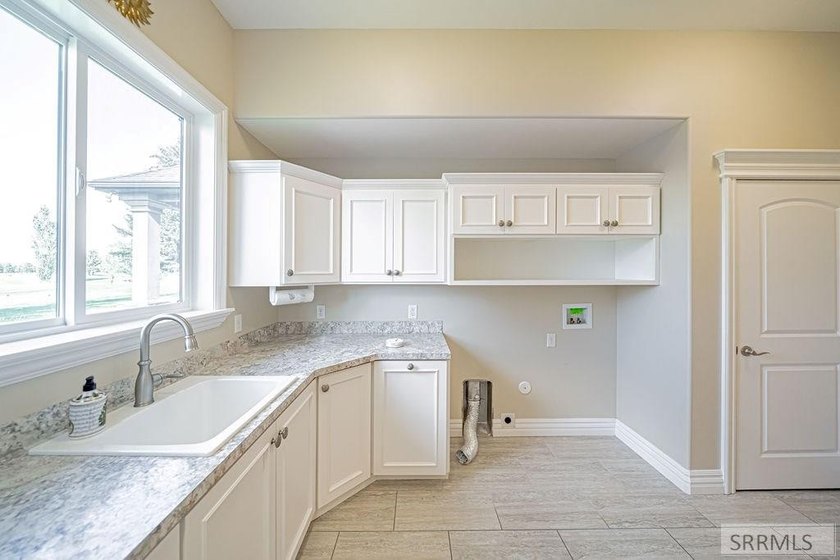 Main-level living at its finest - and yes, your backyard is the - photo 15