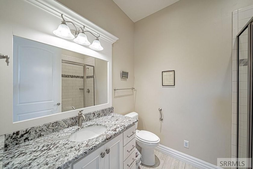 Main-level living at its finest - and yes, your backyard is the - photo 21