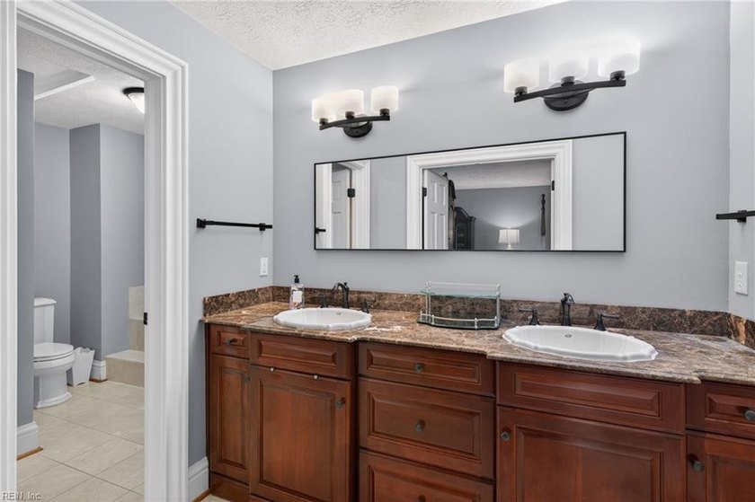 This full brick, custom home has been extensively updated and is - photo 29