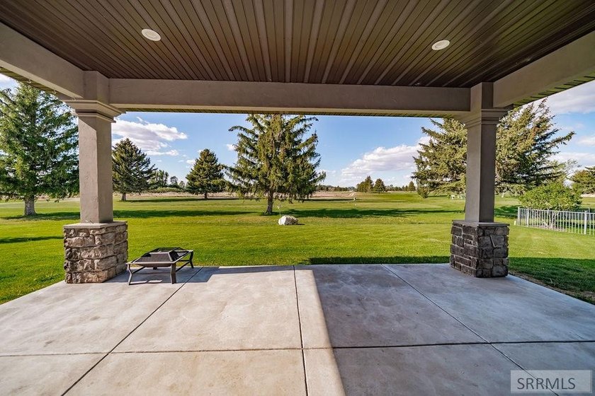Main-level living at its finest - and yes, your backyard is the - photo 39