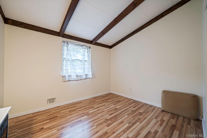 Lovingly maintained three bedroom home featuring an upgraded - photo 11