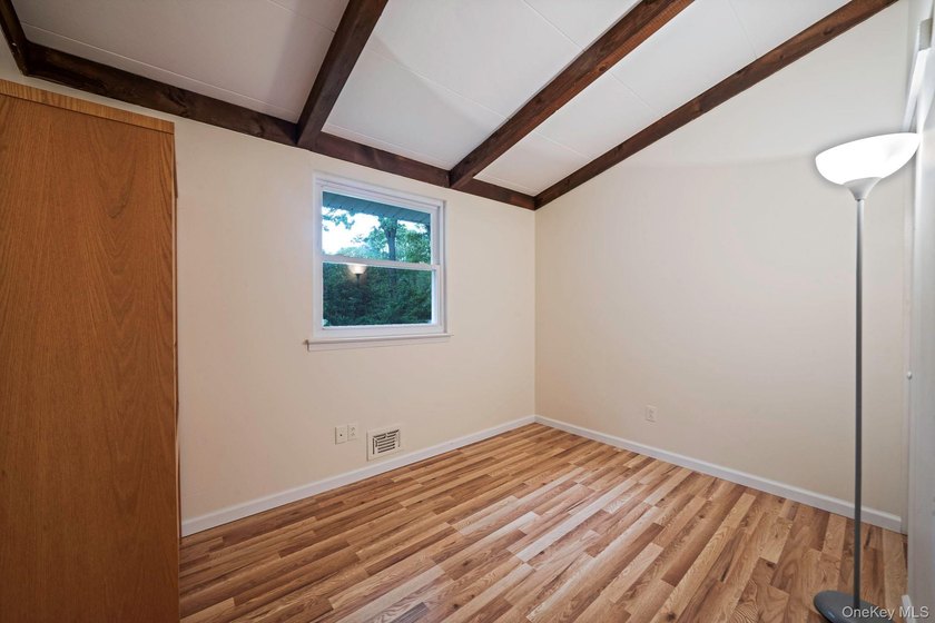Lovingly maintained three bedroom home featuring an upgraded - photo 12