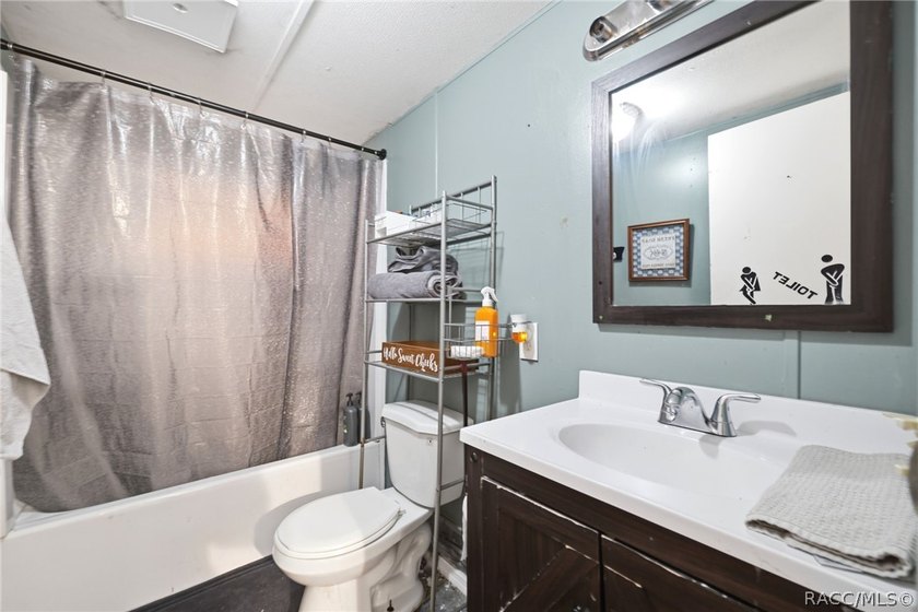 Located on a 0.19-acre corner lot in Floral City, this - photo 29