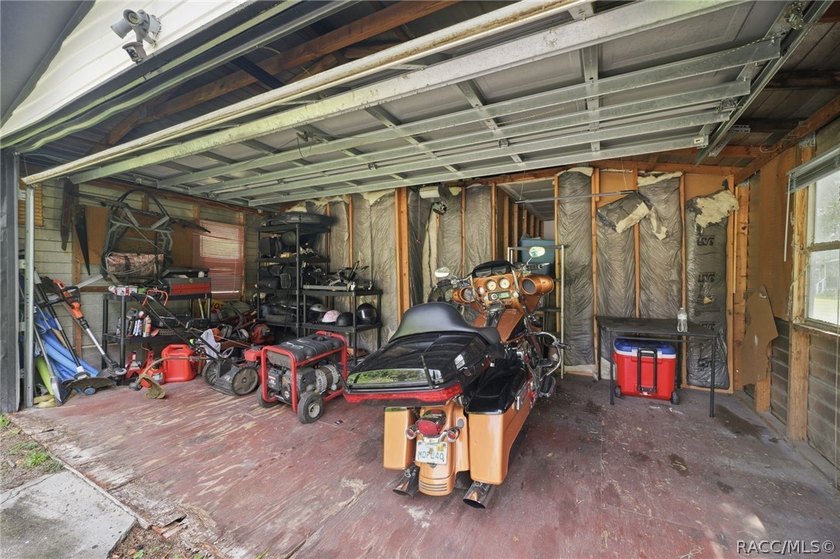 Located on a 0.19-acre corner lot in Floral City, this - photo 32