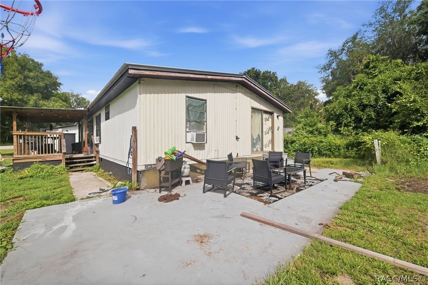 Located on a 0.19-acre corner lot in Floral City, this - photo 34