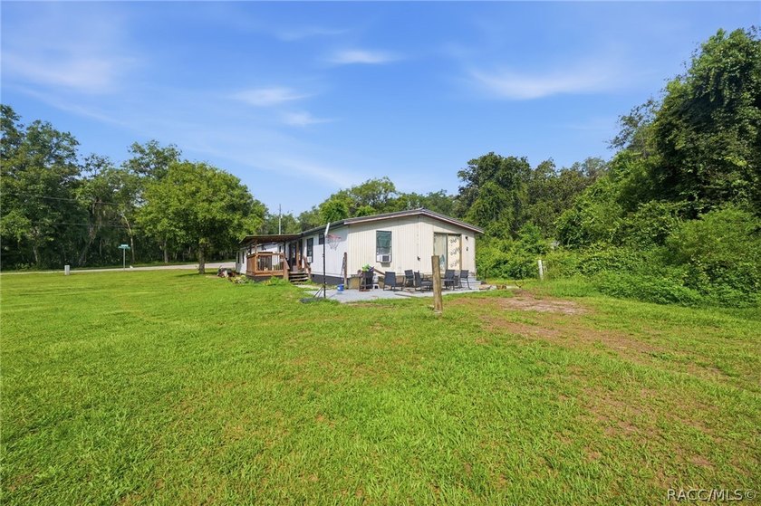 Located on a 0.19-acre corner lot in Floral City, this - photo 36