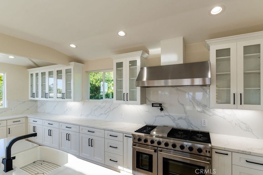 This newly renovated home with breathtaking 180-degree ocean - photo 17