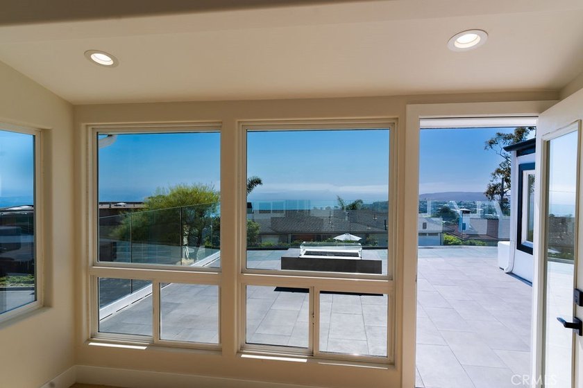 This newly renovated home with breathtaking 180-degree ocean - photo 25