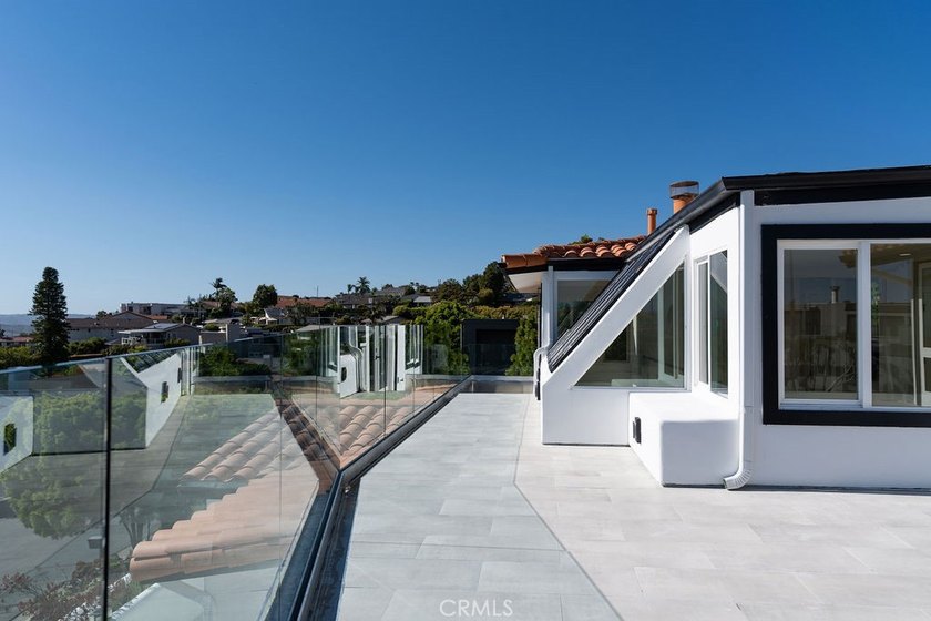 This newly renovated home with breathtaking 180-degree ocean - photo 30