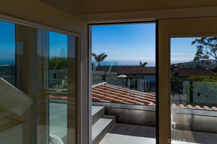This newly renovated home with breathtaking 180-degree ocean - photo 35