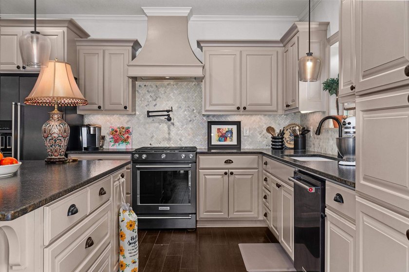 Step into a home where custom craftsmanship, exceptional storage - photo 10