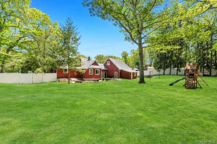 This sprawling and expanded Cape is set on an exceptional .75 - photo 11