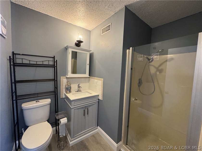 Lakefront 2 bedroom 2 bath fully furnished condo close to many - photo 12