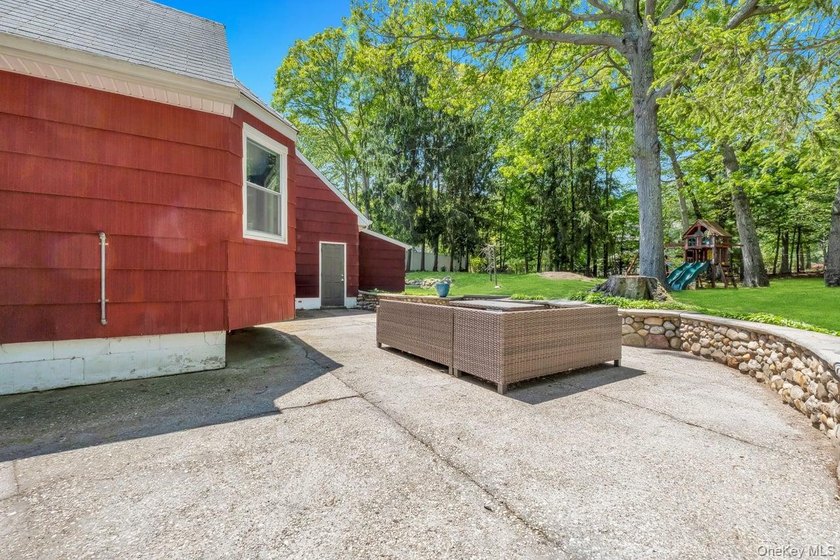 This sprawling and expanded Cape is set on an exceptional .75 - photo 14