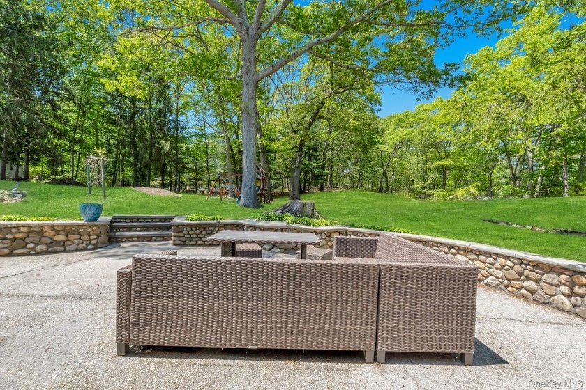 This sprawling and expanded Cape is set on an exceptional .75 - photo 15