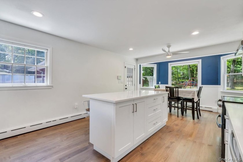 This sprawling and expanded Cape is set on an exceptional .75 - photo 20