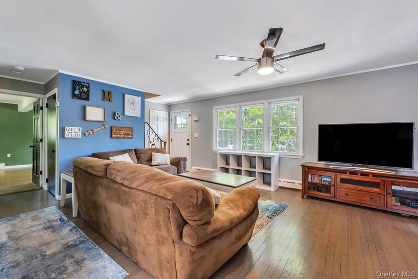 This sprawling and expanded Cape is set on an exceptional .75 - photo 26