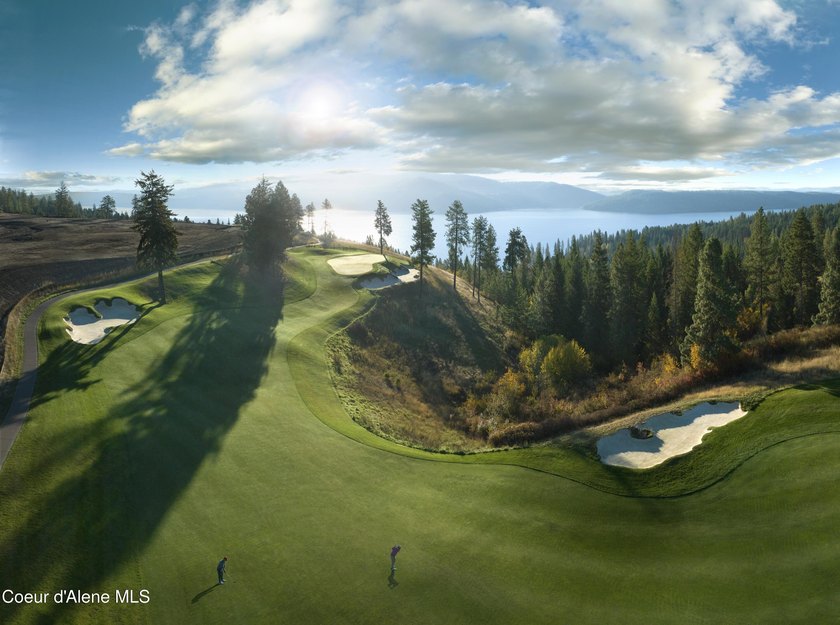 Floating over the 18th fairway and designed for two level living - photo 4