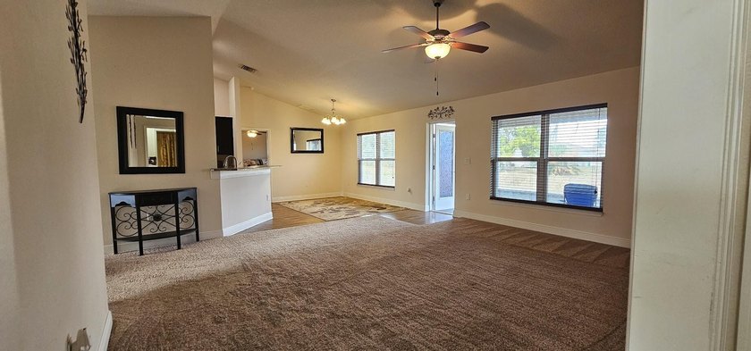 Welcome to a home with unbeatable location. Built in 2015, this - photo 3