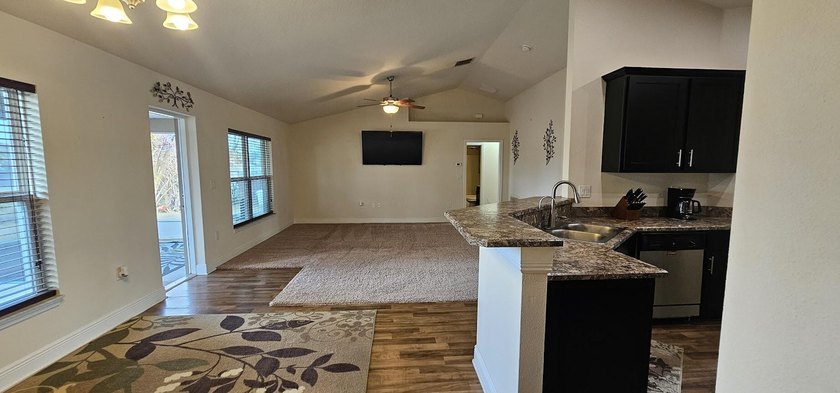 Welcome to a home with unbeatable location. Built in 2015, this - photo 6