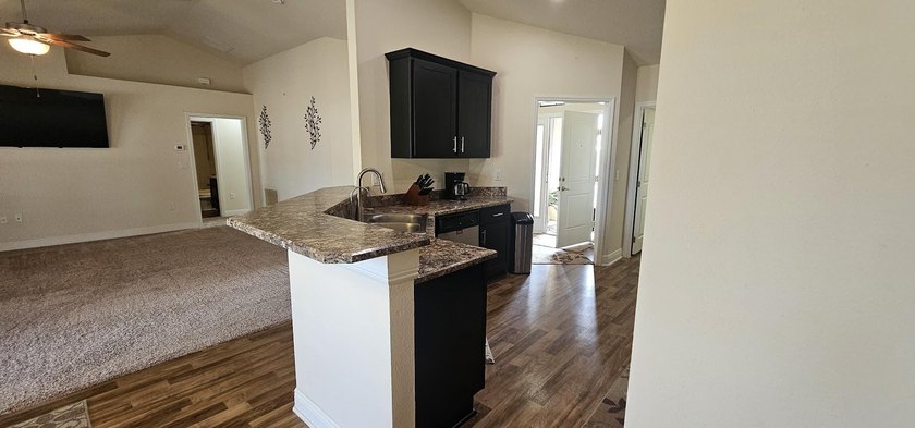 Welcome to a home with unbeatable location. Built in 2015, this - photo 9