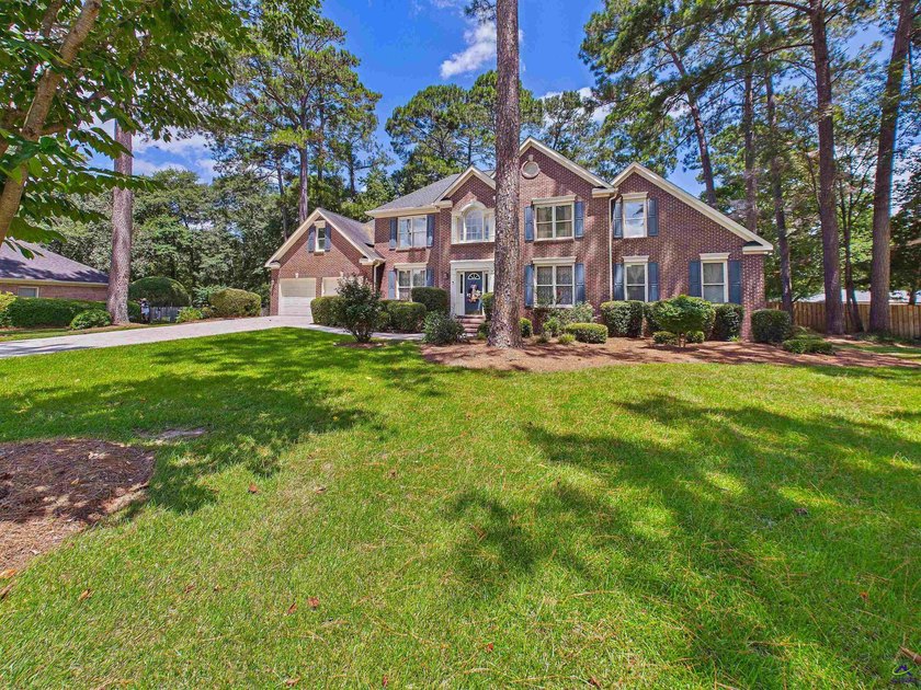 Welcome to this beautifully maintained brick home offering over - photo 2