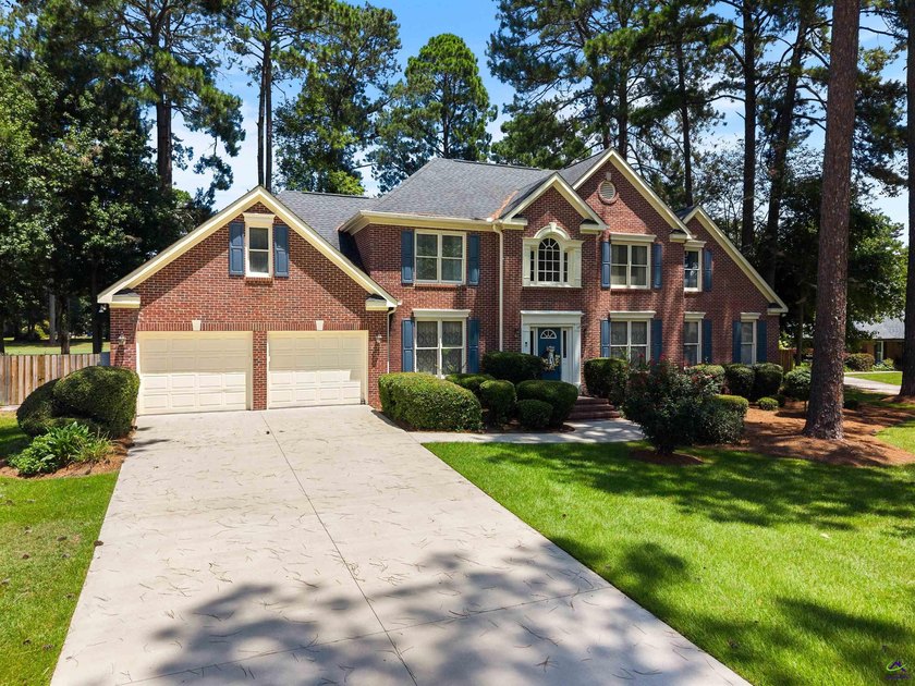 Welcome to this beautifully maintained brick home offering over - photo 4