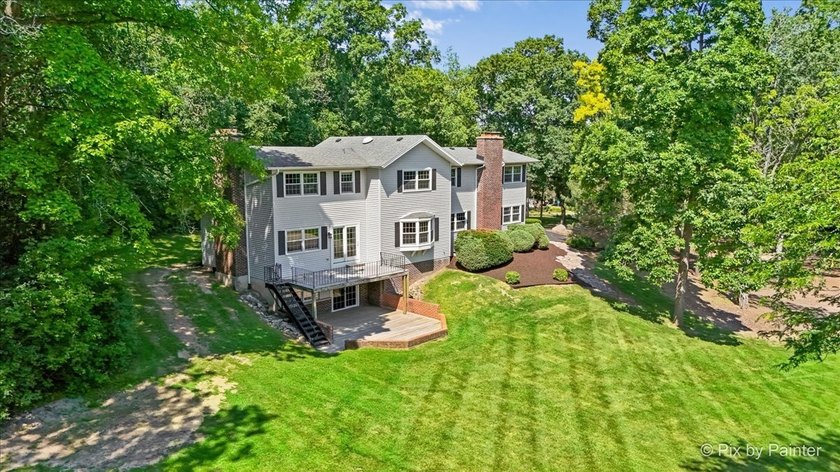 A PRIVATE 3.5-ACRE RETREAT with a STOCKED POND, FOUNTAIN, and - photo 3