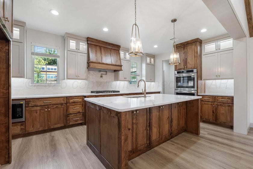 Welcome to this stunning new construction home featuring luxury - photo 8