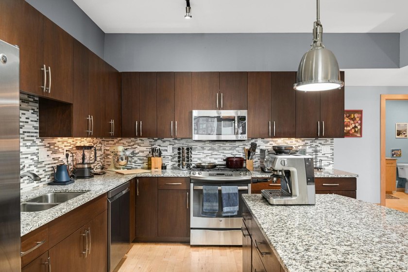 Welcome to unit 316 at Stonebridge Lofts, ideally located just - photo 11