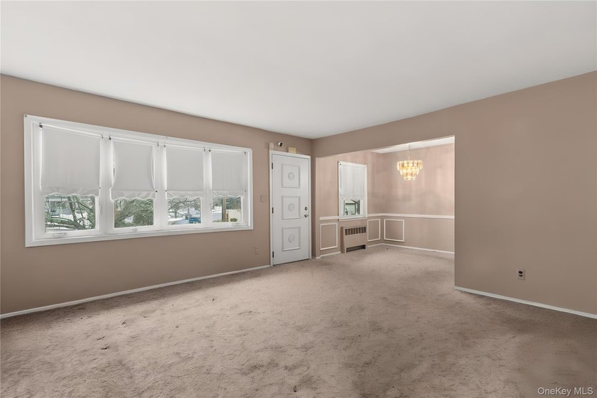 Welcome to this charming and spacious 3-bedroom 2-bathroom - photo 3