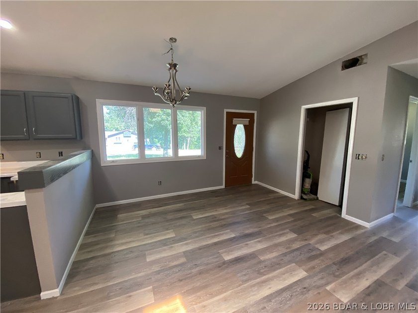 This home checks a lot of boxes: Location, blacktop to your door - photo 12