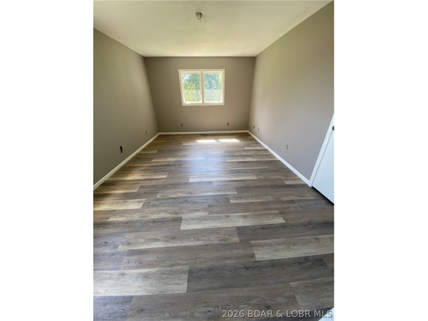 This home checks a lot of boxes: Location, blacktop to your door - photo 21