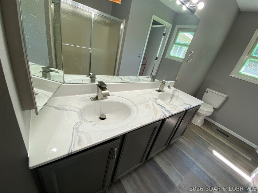 This home checks a lot of boxes: Location, blacktop to your door - photo 24