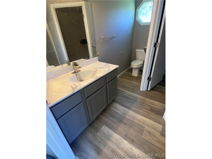 This home checks a lot of boxes: Location, blacktop to your door - photo 30
