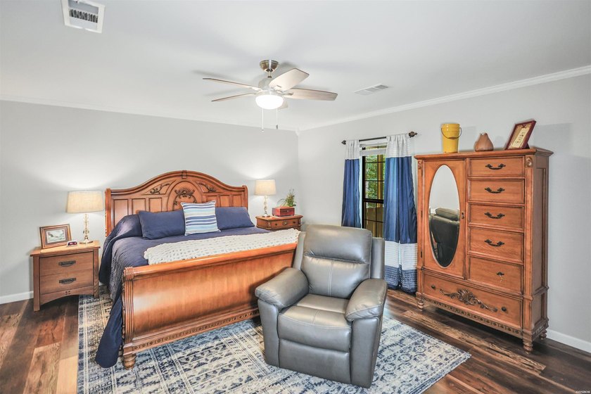 Built in 2022 and tucked away on 4.87+/- secluded acres, this - photo 22