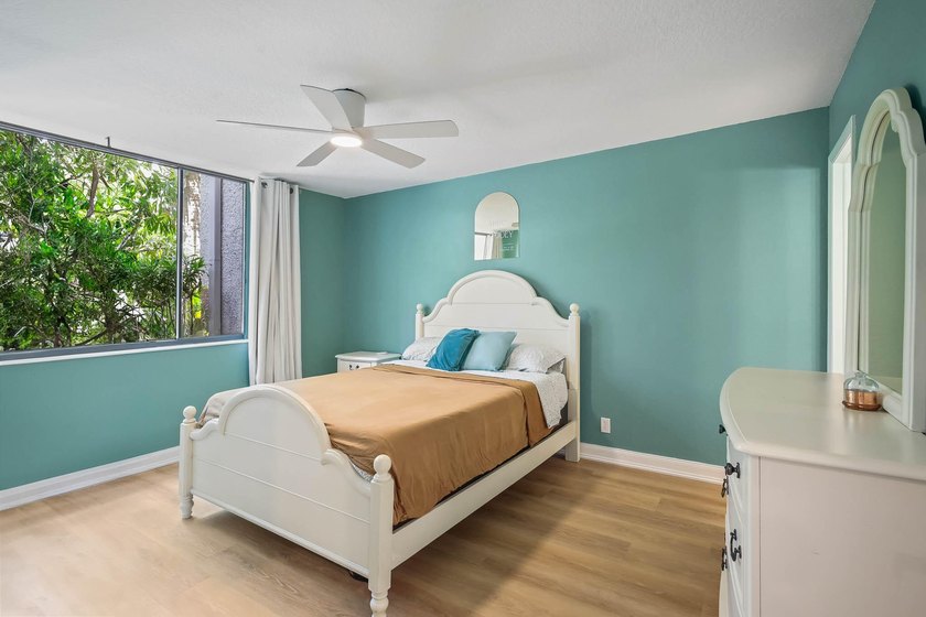 Priced to sell! This well-maintained 2-bedroom, 2-bathroom condo - photo 12